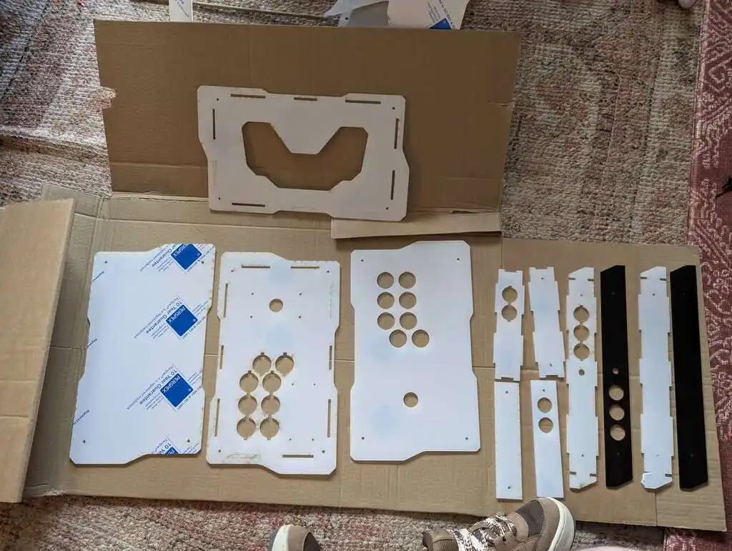 picture of laser-cut arcade plastic sticks