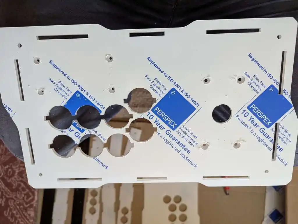 picture of laser-cut arcade plastic sticks
