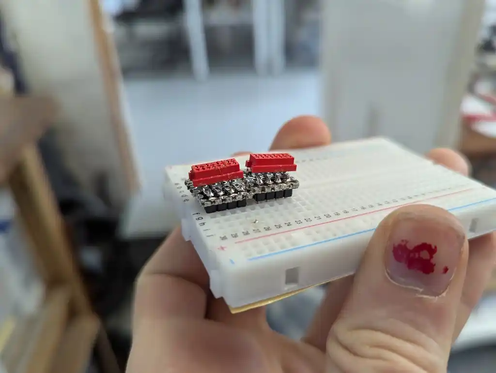 picture of two electronic components on boards on breadboard