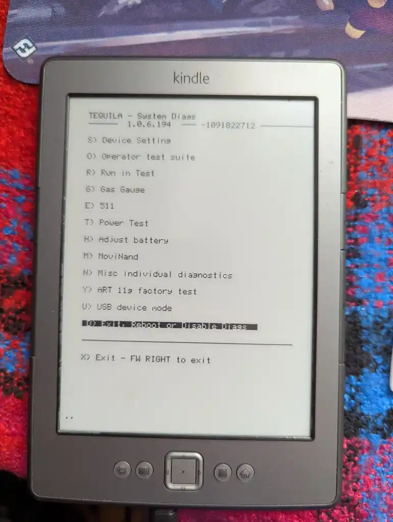 picture of a kindle showing the debug screen