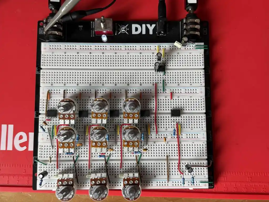 picture of breadboard with several potentiometers