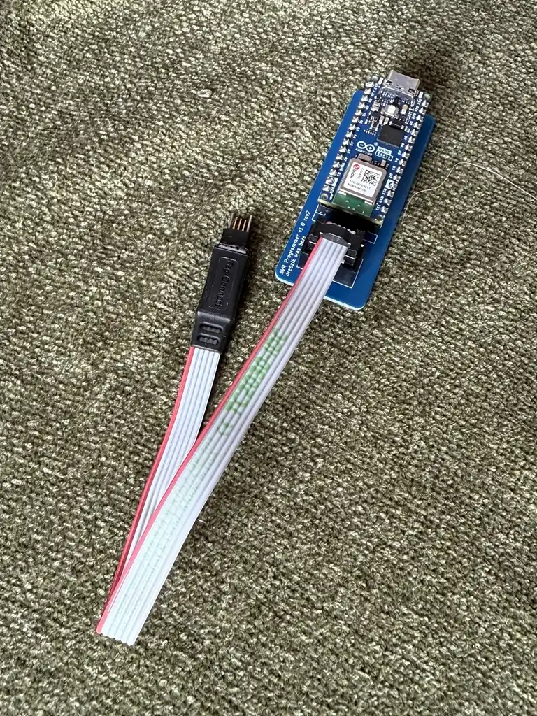 picture of electronic device connected to ribbon cable