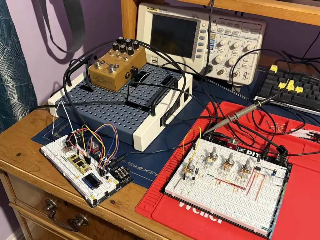 picture of electronics workbench with various items