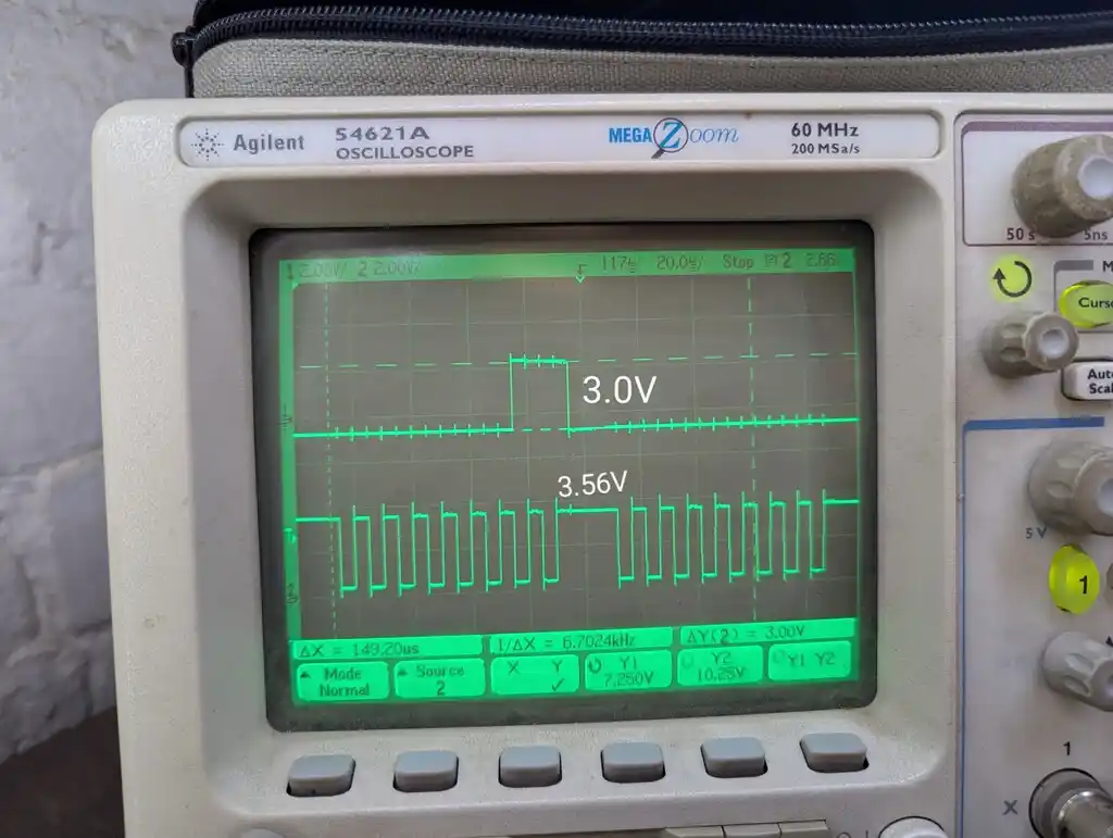 picture of oscilloscope showing two traces