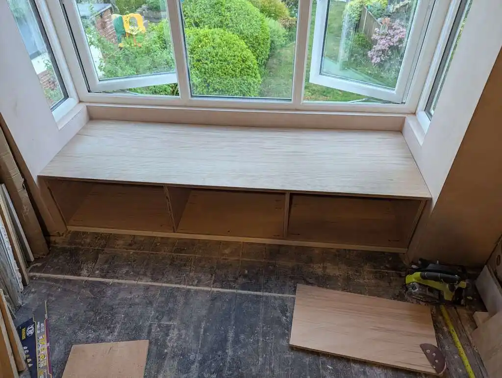 picture of window bay, with assembled cupboards