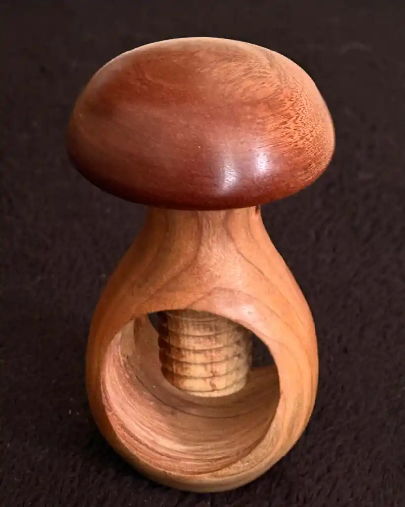 picture of a wooden nutcracker shaped like a mushroom