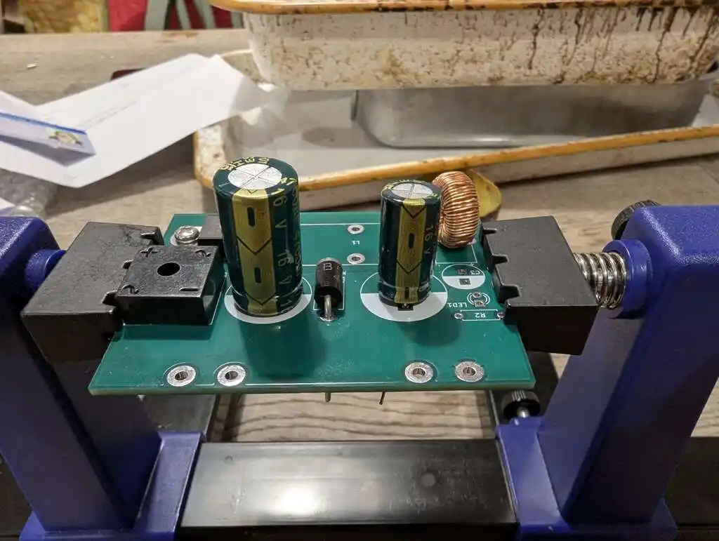 picture of electronic circuitboard with two large capacitors