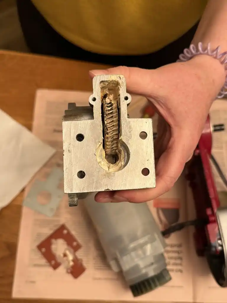 picture of greasy inside gear of food processor