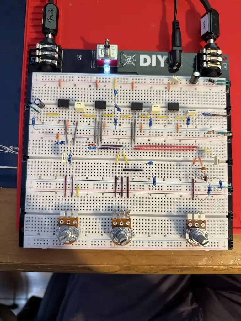 picture of breadboard with lots of components, conections, and 3 potentiometers