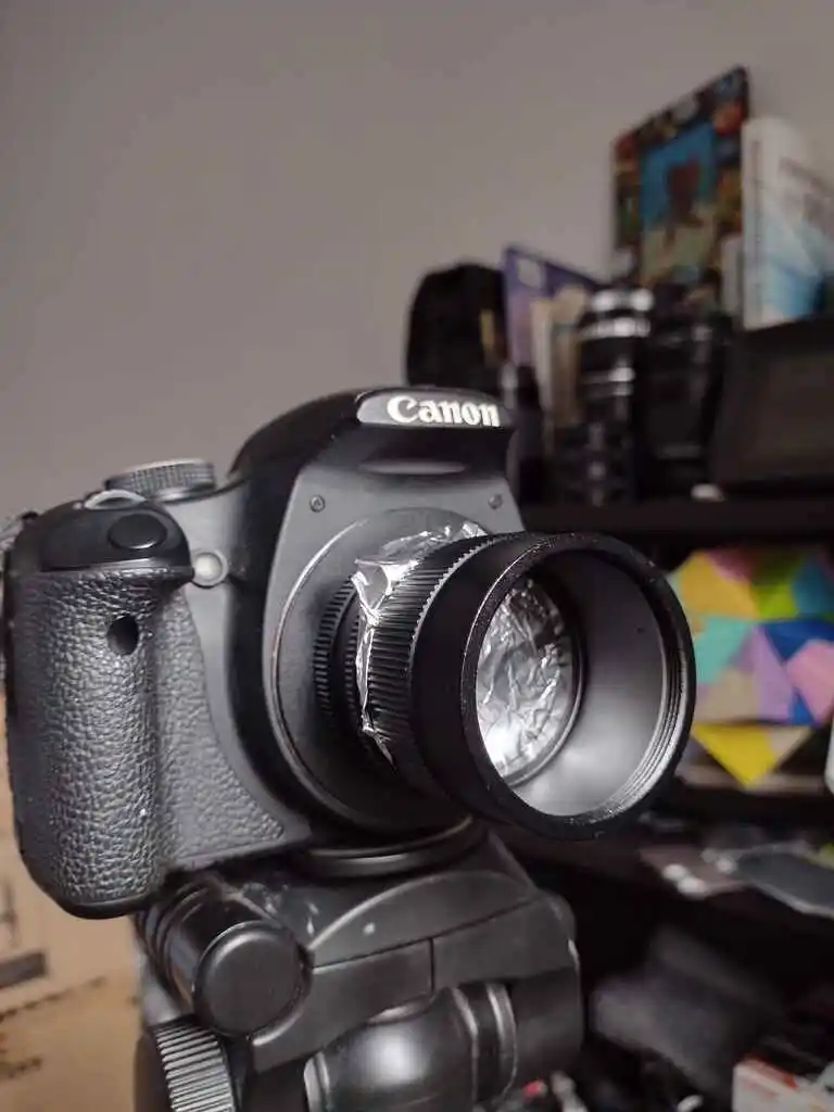 picture of a digital camera with a pinhole lens attached