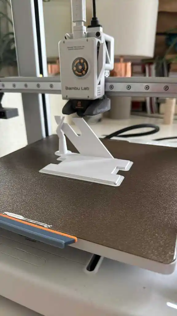 picture of 3D printer printing coat hooks