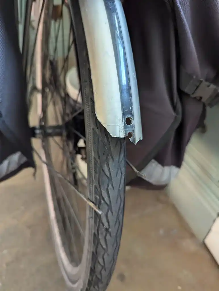 picture of bike mudguard, broken and not attached