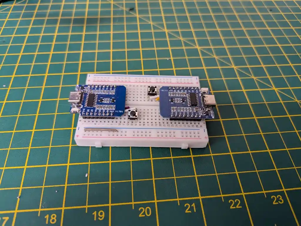 picture of breadboard with two disconnected microcontrollers