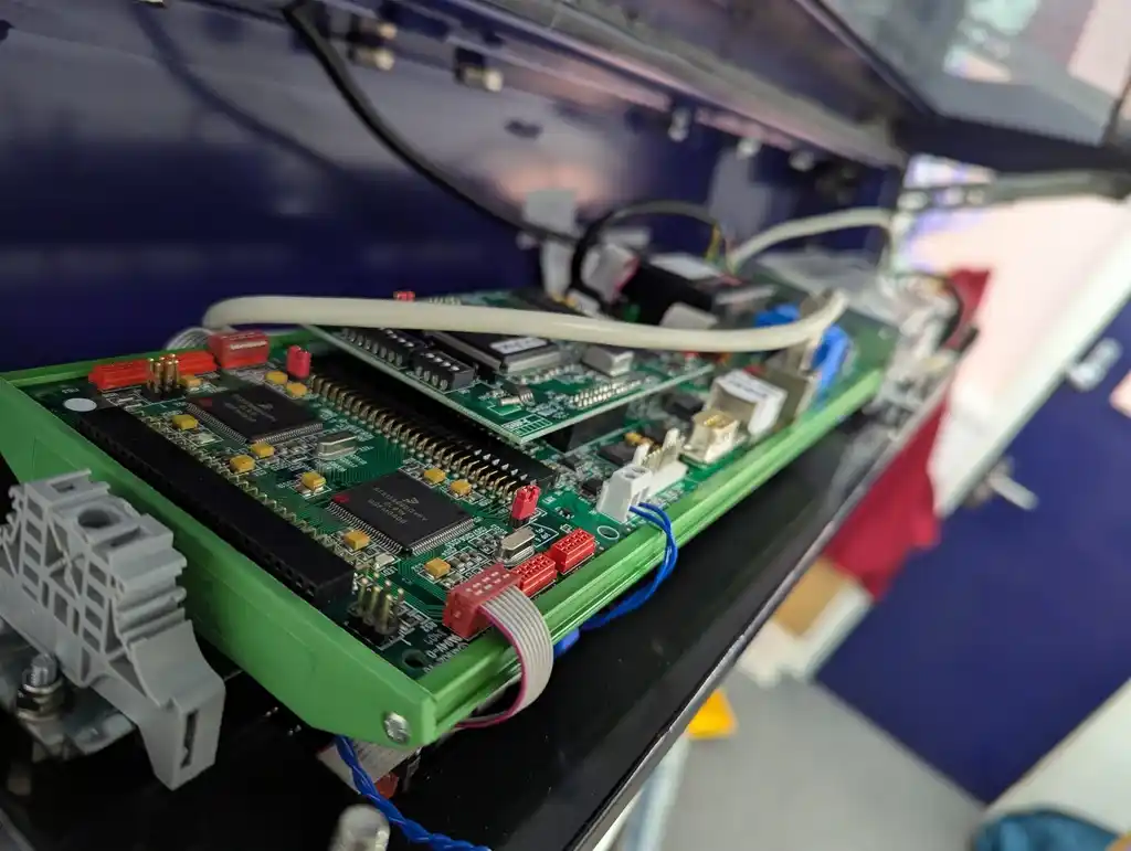 picture of internals of electronics, showing many PCBs