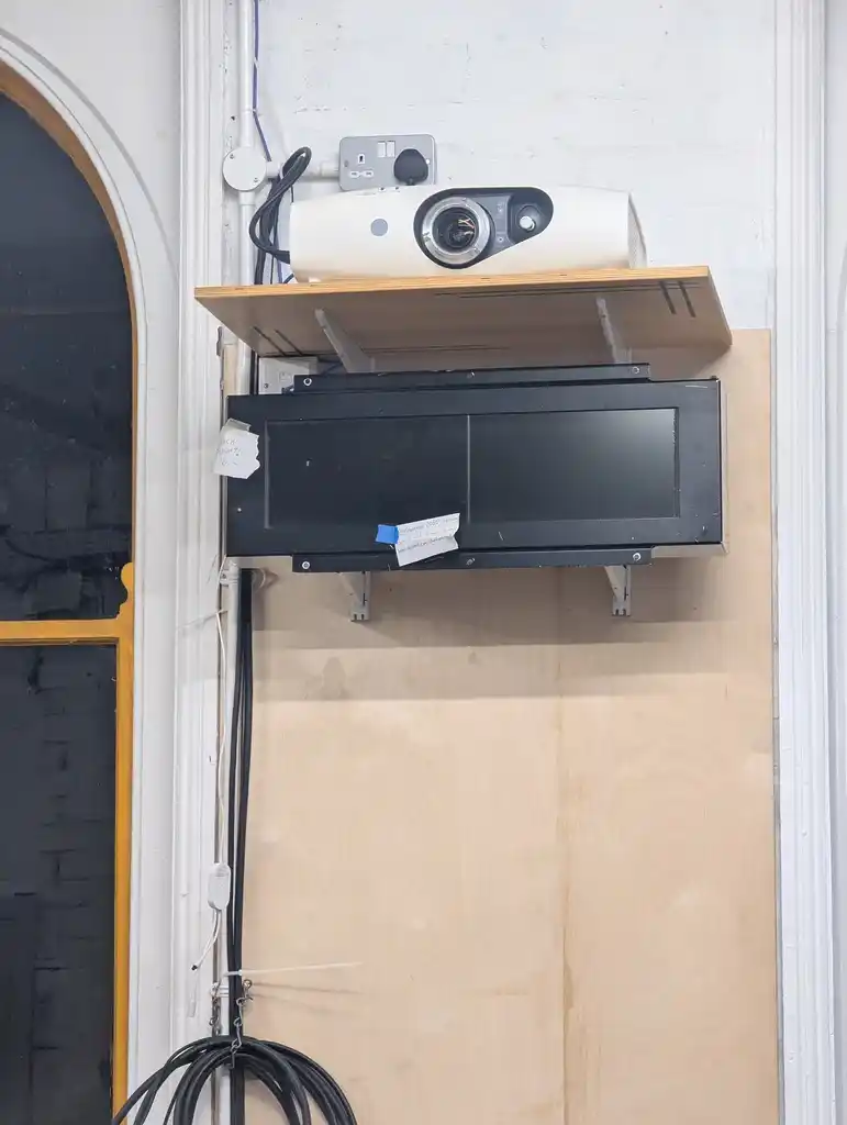 picture of an old transport sign on a shelf bracket