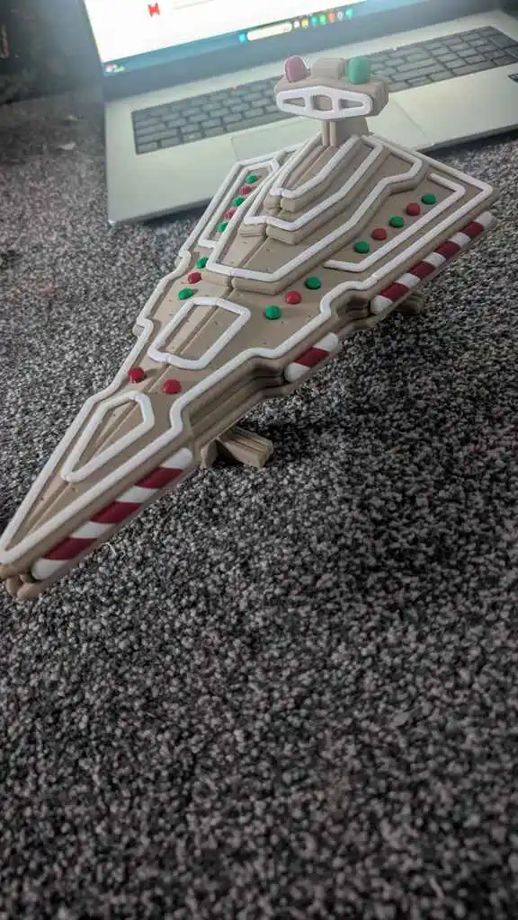 picture of a 3D printed Star Destroyer made to look like gingerbread