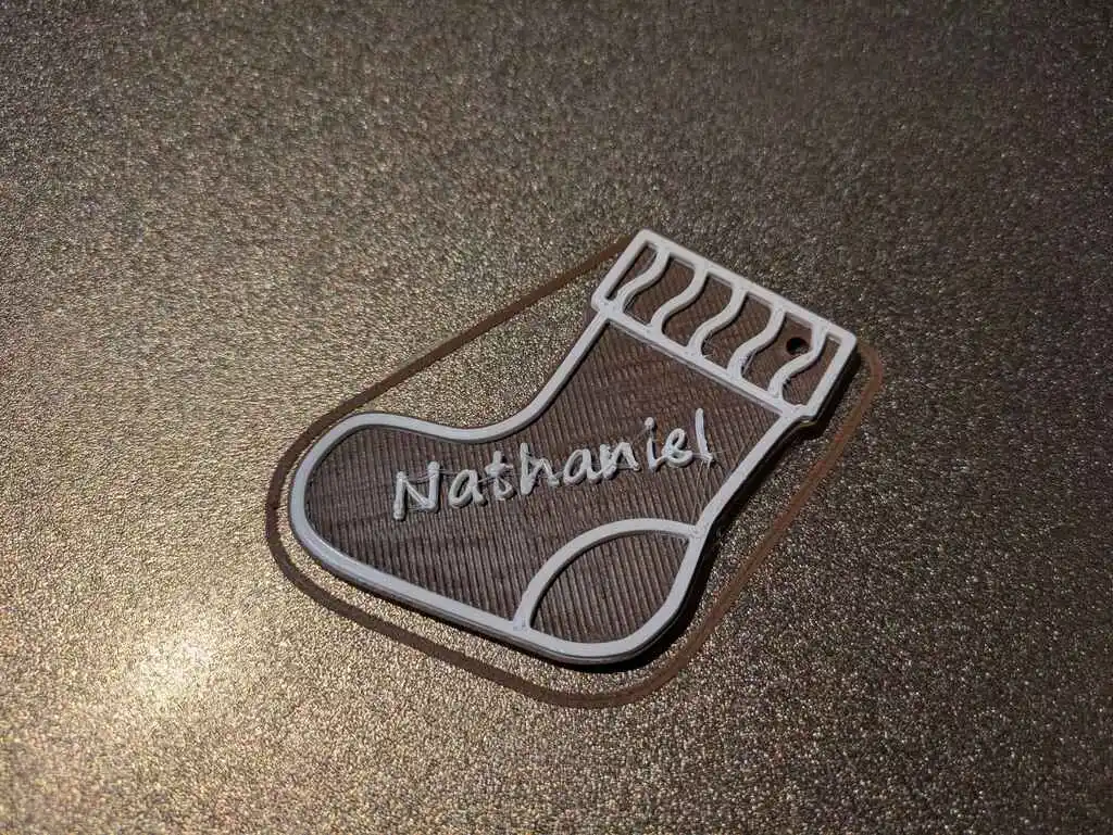 picture of 3D printed stocking, on a print bed