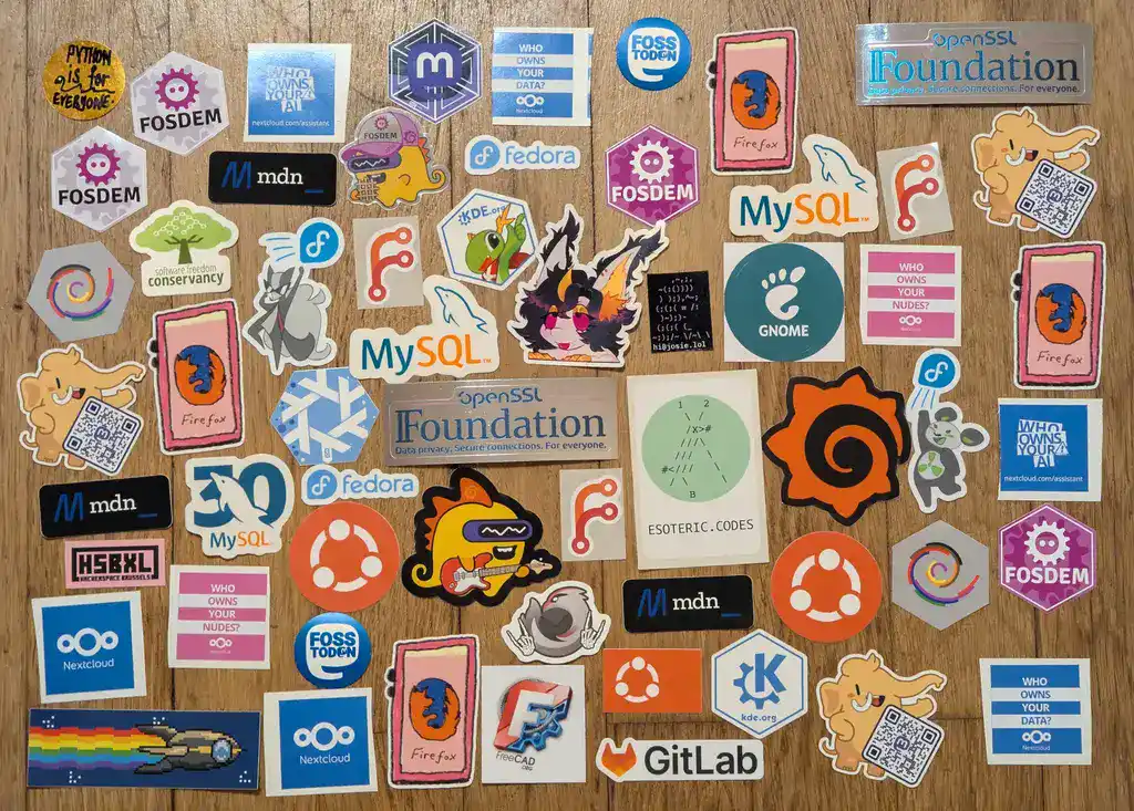 picture of a lot of stickers from FOSDEM, mainly of open source projects