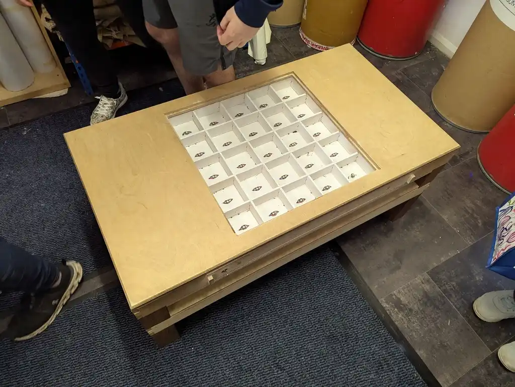 picture of coffee table with grid of LEDs in the middle