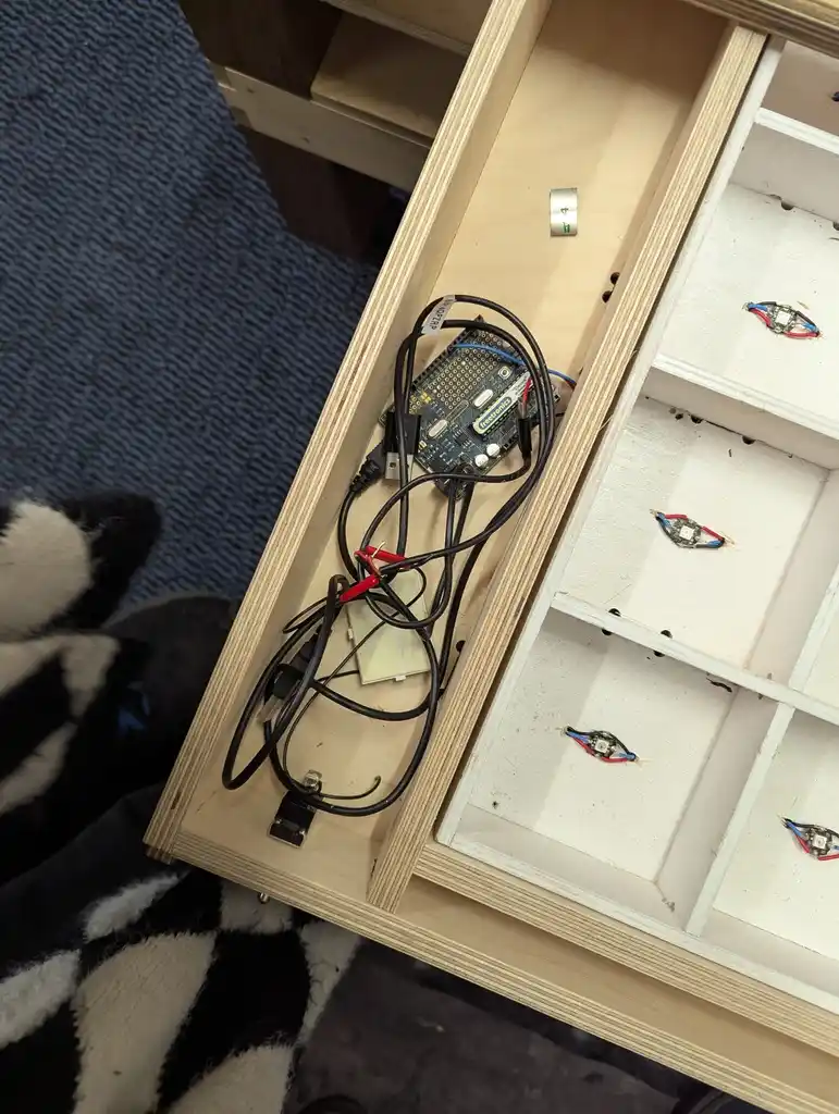 picture of drawer filled with electronics
