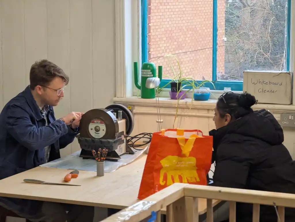 picture of a person sharpening a knife