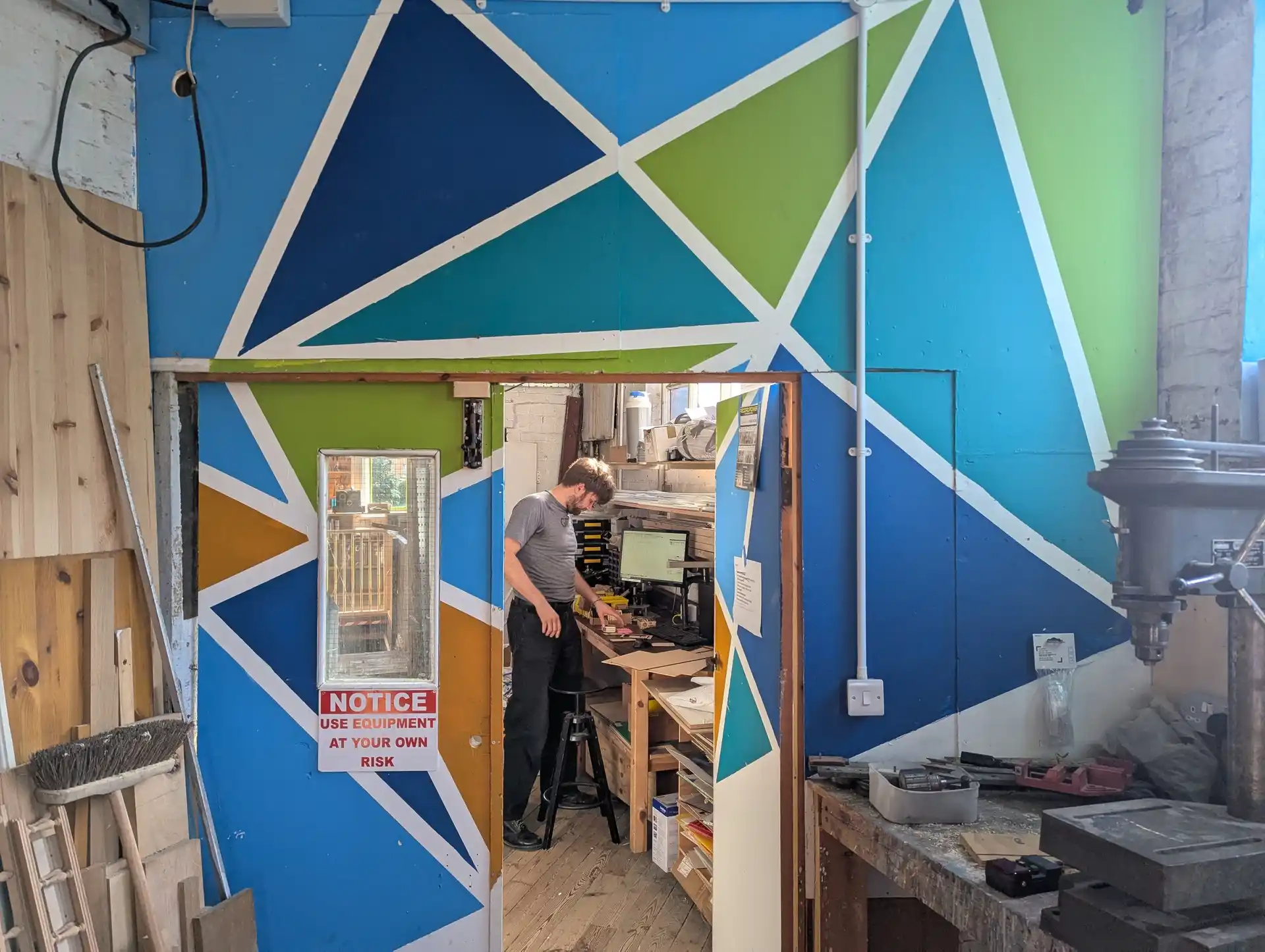 picture of a person through a colourful doorway