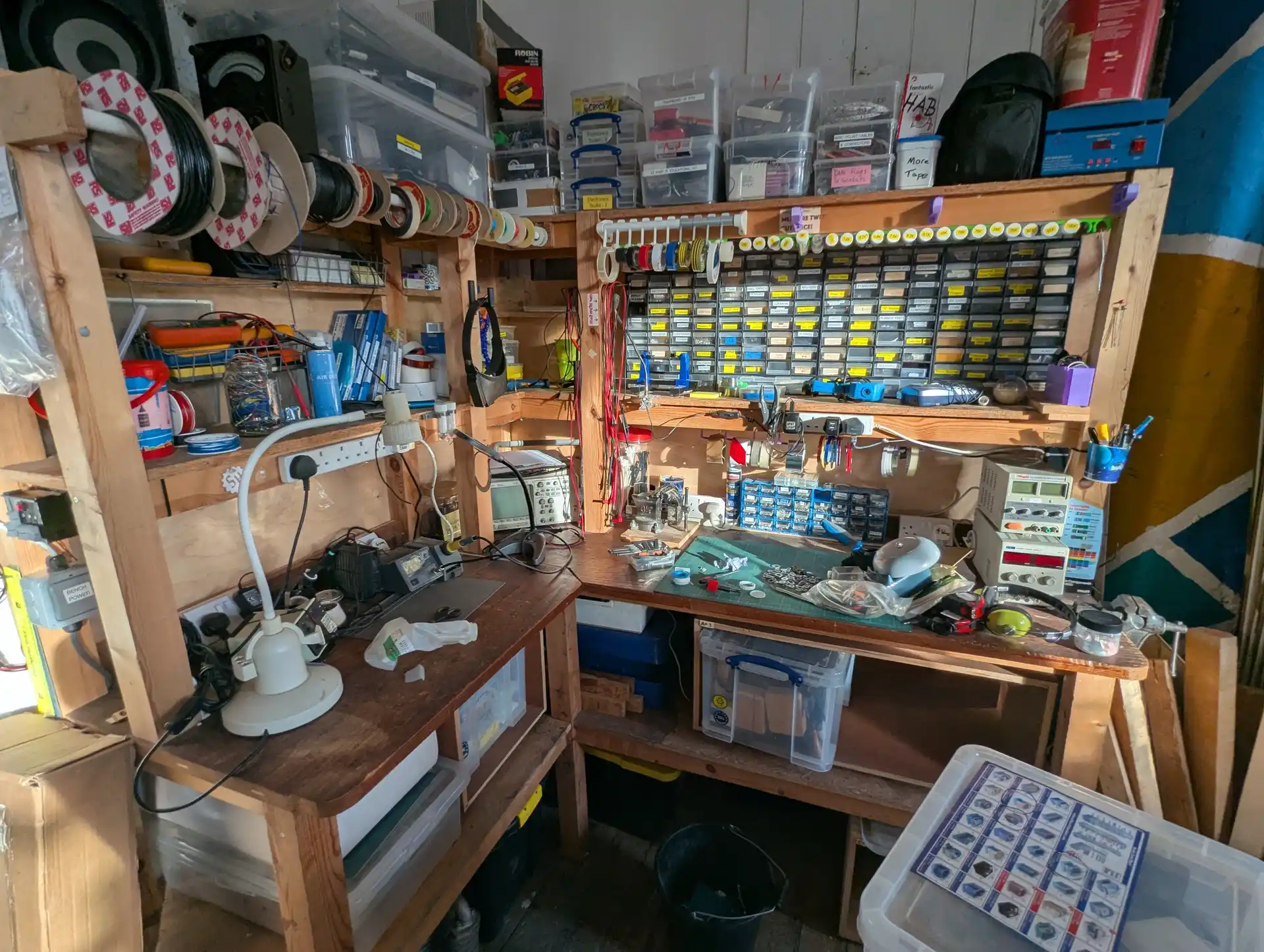 picture of a workbench with lots of electronics tools